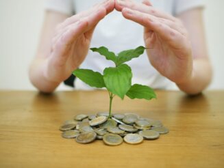 imagem mostra moedas para Melhores Investimentos
